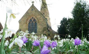Lullington_Church_with_spring_flowers_-_geograph.org.uk_-_1103346